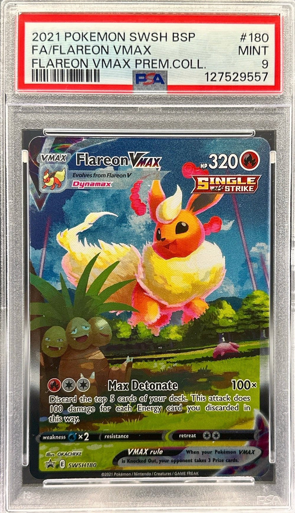 Pokémon trading card featuring Flareon VMAX in a protective case with PSA grading label. #180 PSA 9