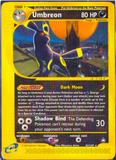 Pokémon trading card featuring Umbreon with a dark moon effect
